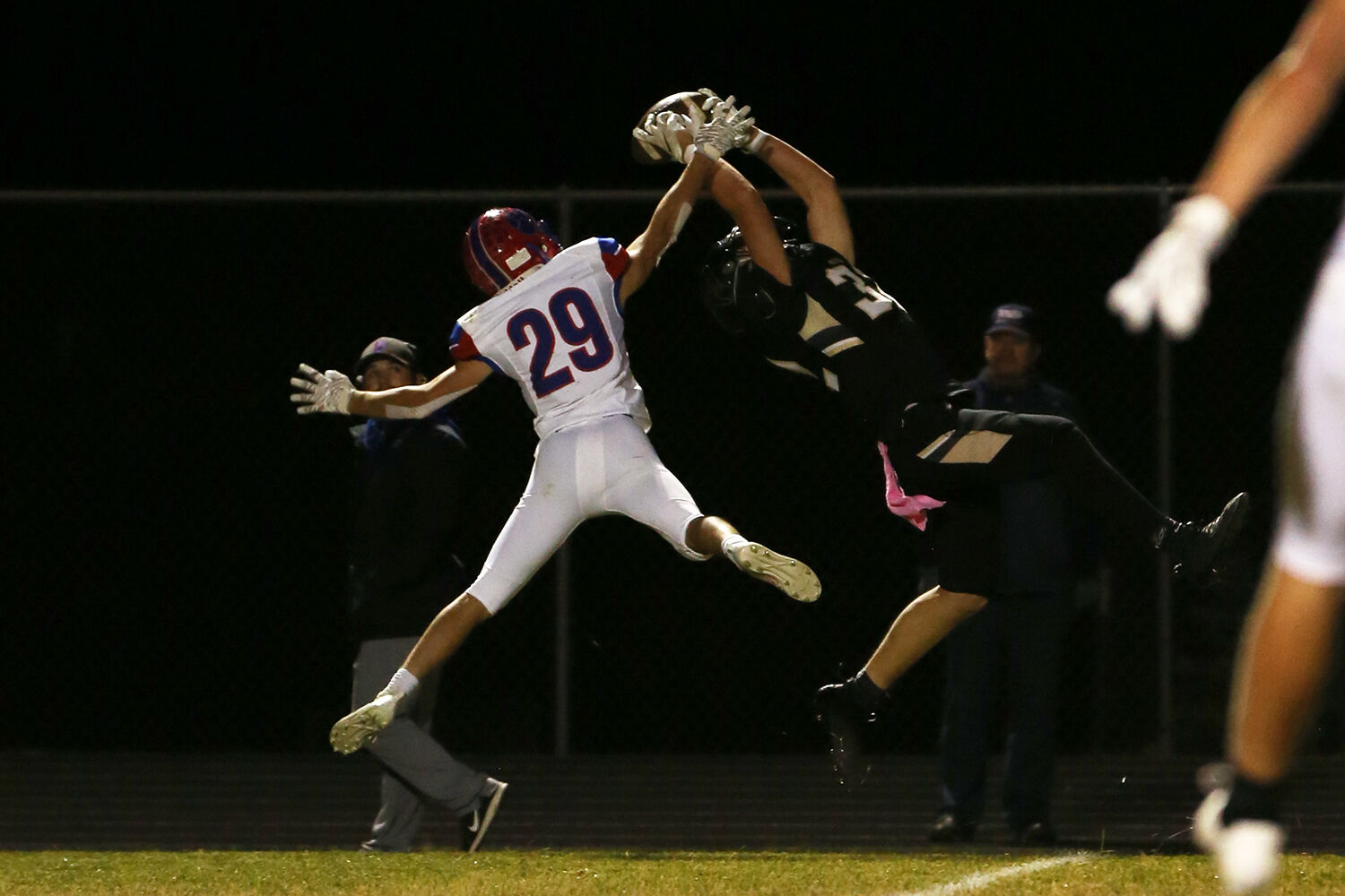 Calvin Rule stretches backward as the ball falls